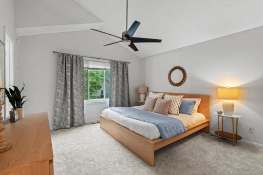 Three bedrooms are located on the upper level, all with new carpet (2025).