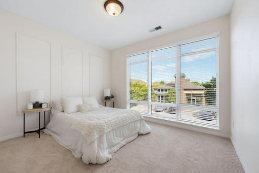 Retreat to the primary oasis with more stunning windows, large walk-in closet & huge primary bath.