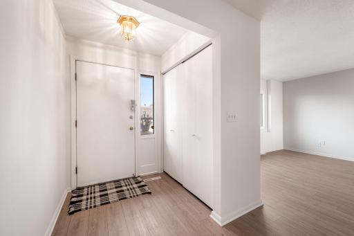 Welcomed by a bright entryway with expansive coat closet.