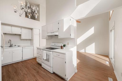 Bright, white kitchen with ample cabinetry