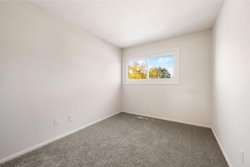 Second upper level bedroom, perfect for an in-home office.