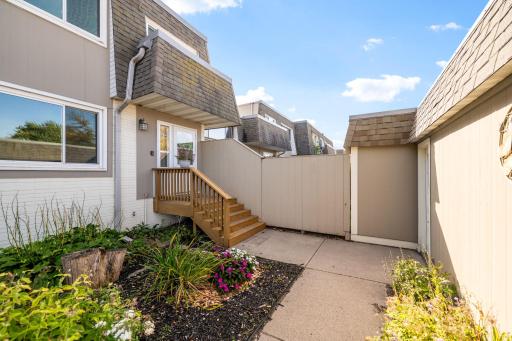 Beautifully maintained landscaping & charming front porch add so much curb appeal.