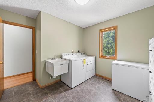 Spacious Laundry/Mudroom as you come in from the garage.