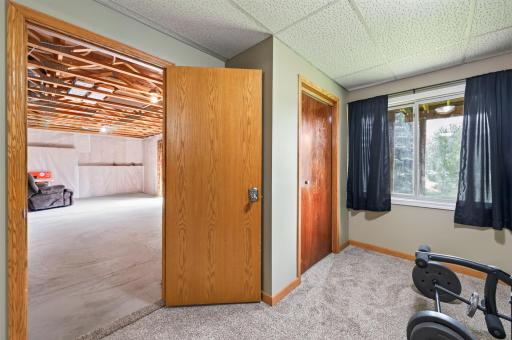A view from the basement bedroom into future rec room.
