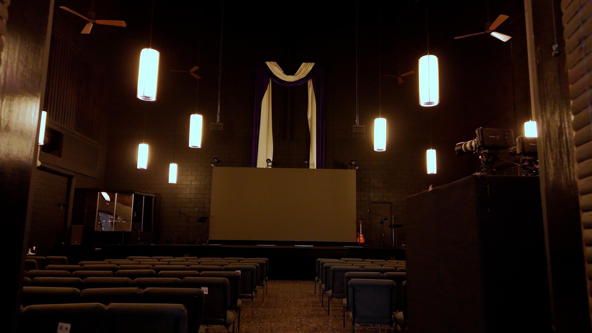 Sanctuary updated with large screen, stage, audio/visual equipment and sound booth.