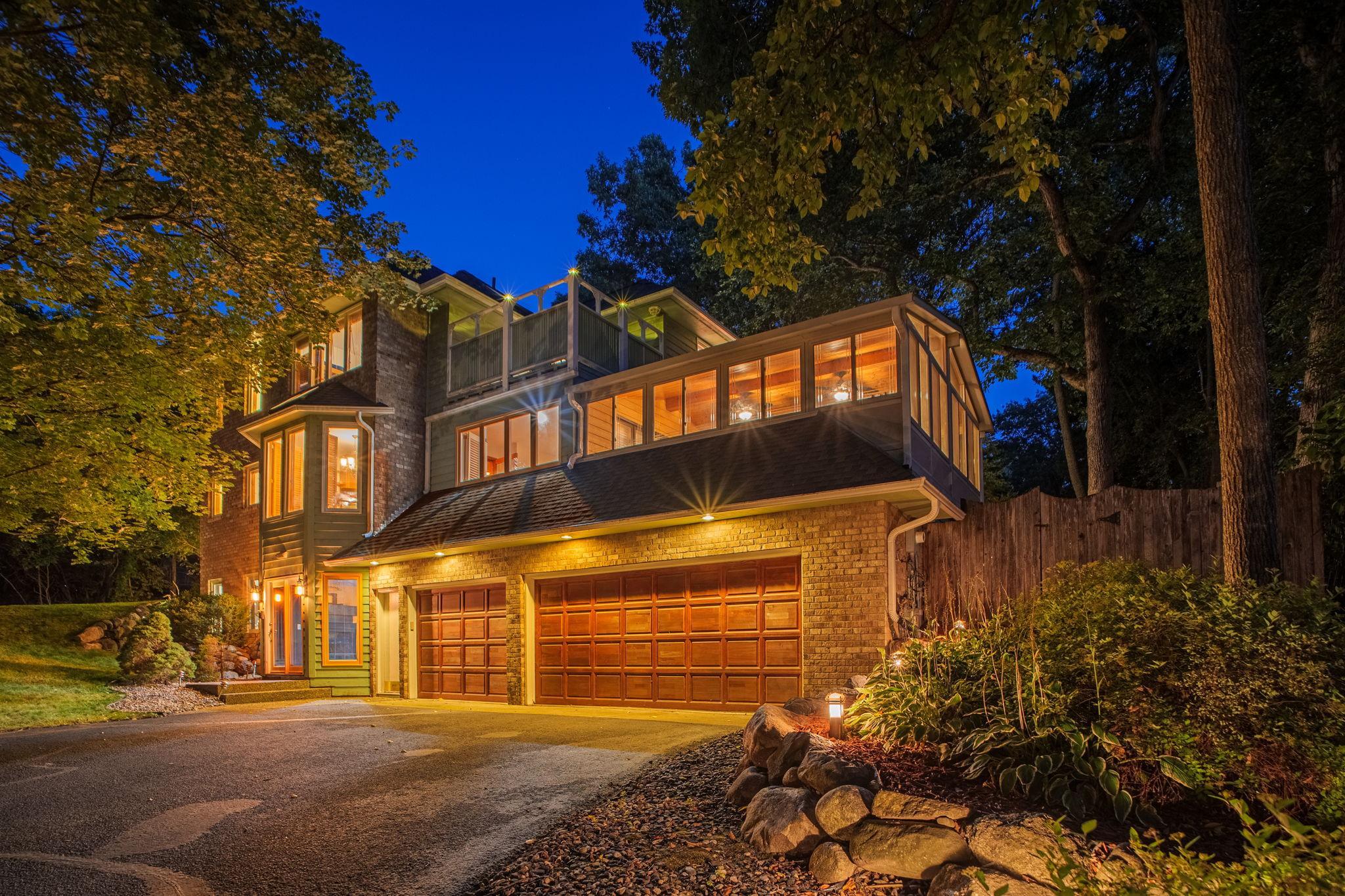 Plenty of Garage Space, With a Gorgeous 3 Season Porch Above, The Spaces Here are Amazing!