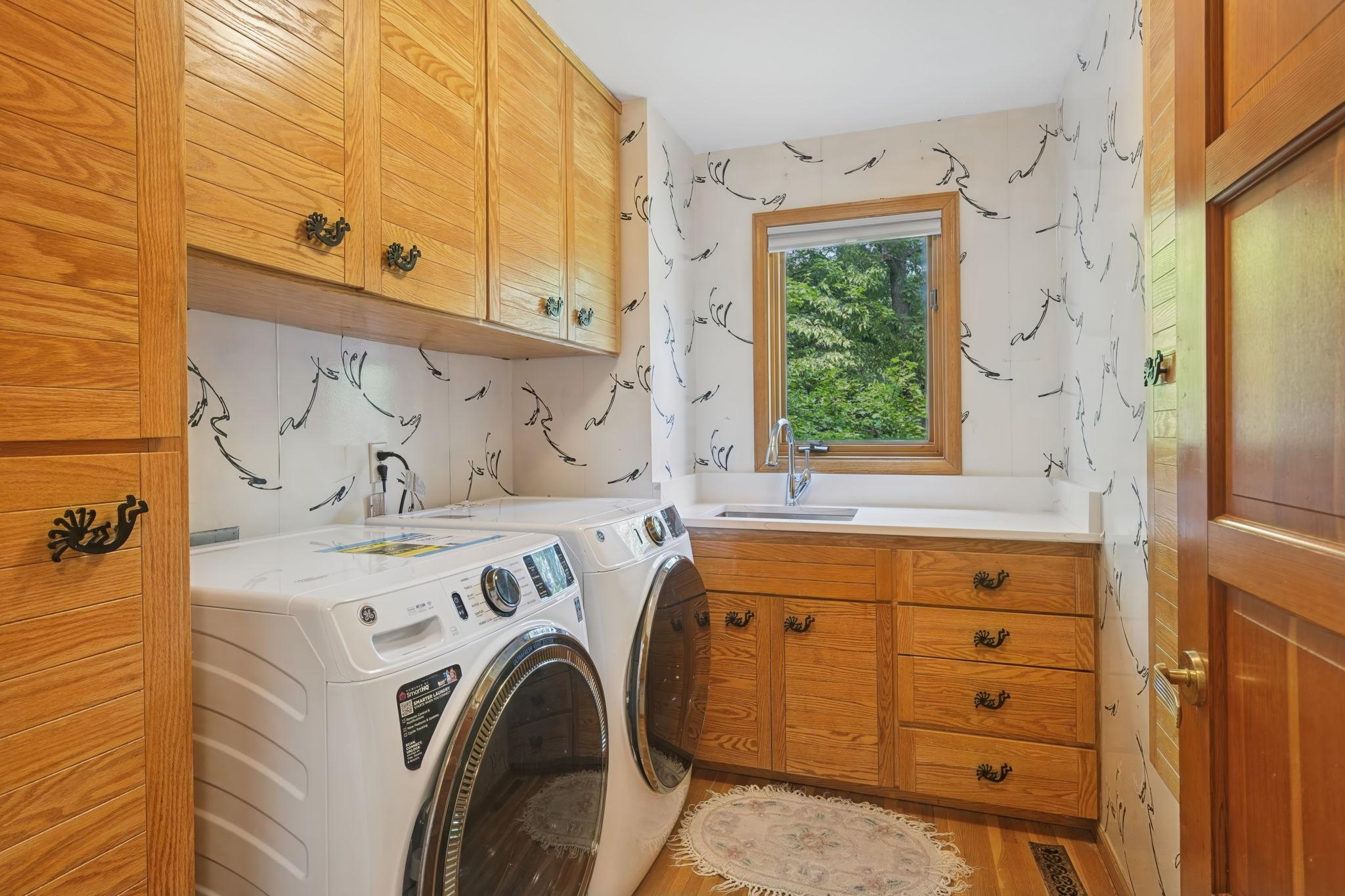Main Level Laundry Featuring Brand New Washer and Dryer