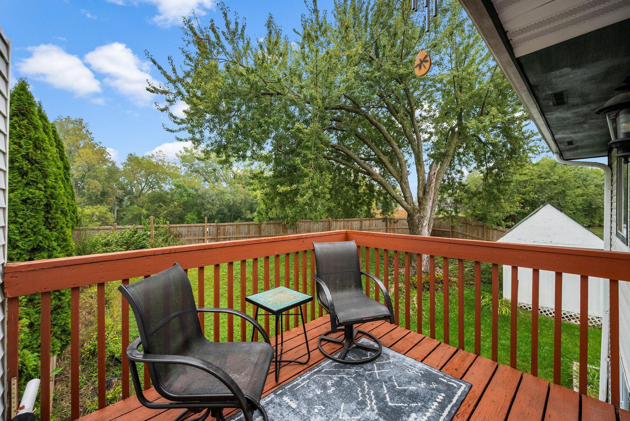 Deck off Dining Room with private views of back yard!