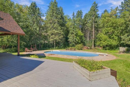 5994 425th St - In-Ground Heated Pool with Privacy of Pines & Great Sunlight