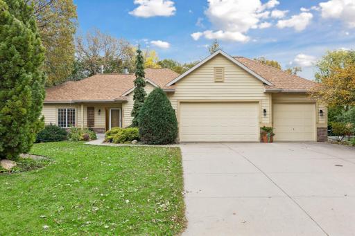 This showcase rambler sits on a .5 ACRE lot backing up to Lake Marion.