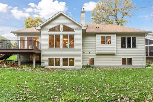 Front of the home is cedar and brick, the rear and sides are vinyl.