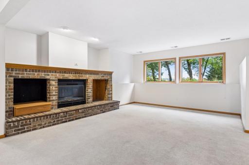 Brick built-ins with fireplace and views of Lake Marion.
