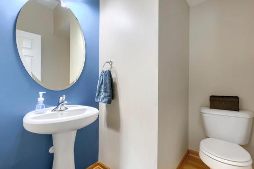 Convenient half bath completes the main level and is perfect for guests!