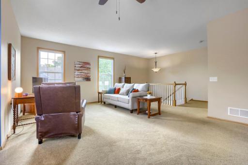 Spacious living room with tons of natural light!