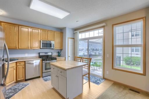 The kitchen offers abundant cabinet and counter space!