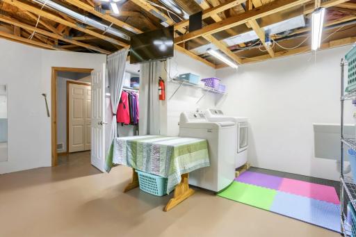 The lower level features the laundry area with a newer washer and dryer!