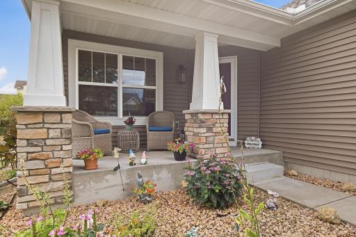 Make this enticing porch your cozy place to come home and enjoy!