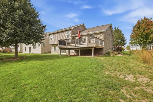 2012 quality built three-level split home with Brazilian Tigerwood deck and custom landscaping.