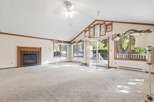 Fireplace in the sunroom adds a cozy touch for the colder MN weather!