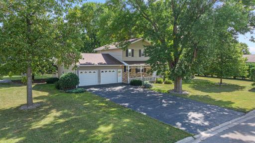 Photo for 301 Birch Street, Lucan, MN 56255 - listing #7144336 Situated on a large corner lot and surrounded by mature, trimmed hedges for a private and serene retreat - welcome to 301 Birch Street in Lucan!