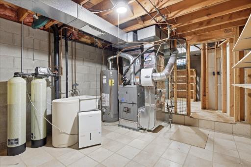 Spacious utility room provides convenient access to the homeâs updated mechanical systems and additional room for storage.