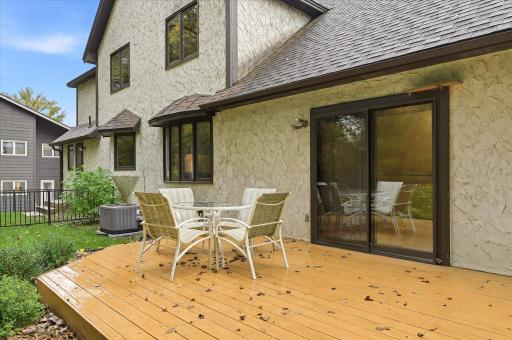 Enjoy the peaceful backyard setting from the deck, surrounded by mature trees and established landscaping.