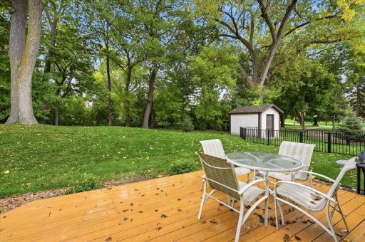 Backyard storage shed provides additional space for lawn equipment, gardening supplies, and seasonal items.