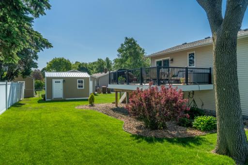 Neighbors' back fence gives this property privacy.