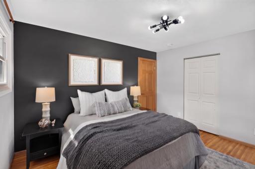 Main level: primary bedroom 1 with private 1/2 bath