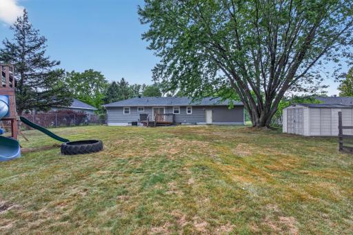 Fantastic large flat backyard with play set included