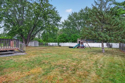 Fantastic large flat backyard with play set included