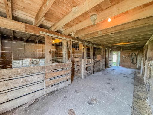 34x55 Red Barn with horse stalls & tac room - hydrant in barn