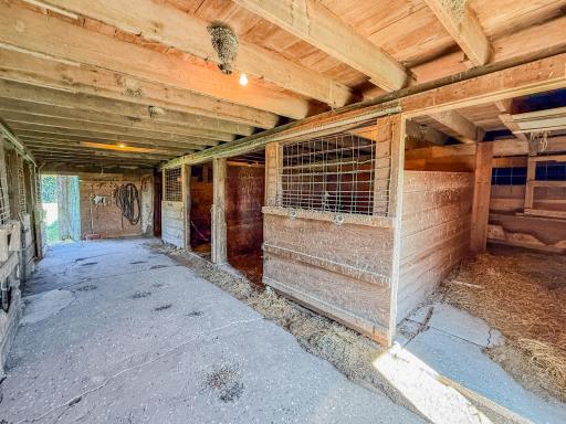 34x55 Red Barn with horse stalls & tac room - hydrant in barn