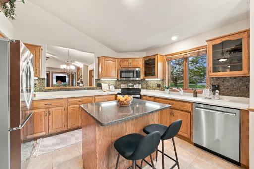 Updated windows, countertops and tile backsplash