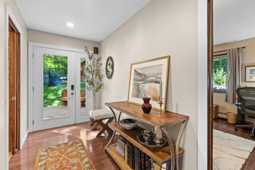 A bright, welcoming foyer leads into the main living spaces.
