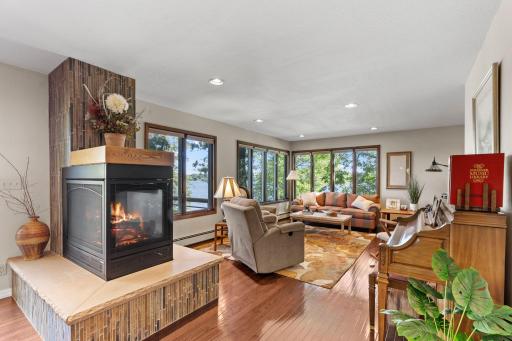 Settle in by the fireplace and enjoy the lake through a wall of windows.