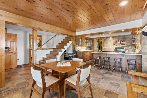 The finished lower level has its own full kitchen and dining space.
