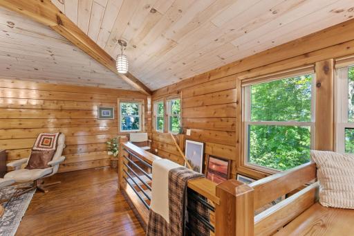 Vaulted wood ceilings give the garage apartment plenty of character.