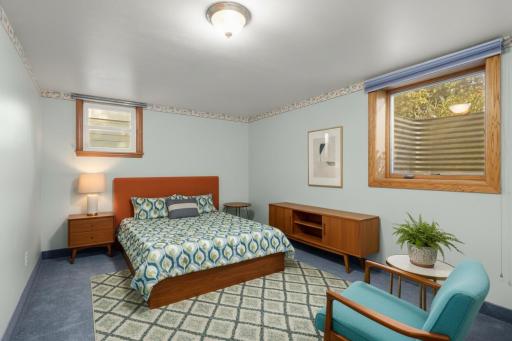 The lower level features the fourth bedroom. (Virtually staged)