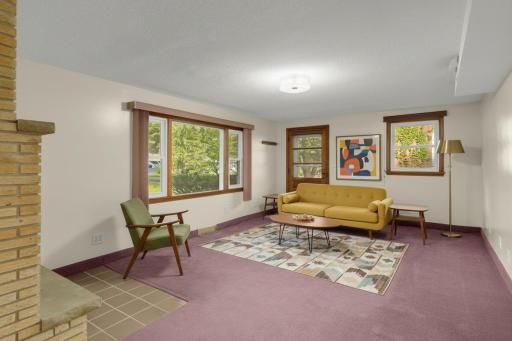 Enjoy a virtually staged lower-level amusement room.
