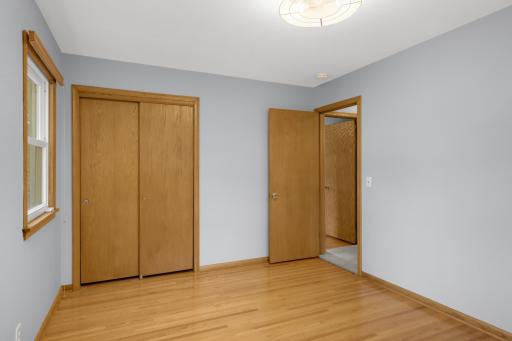 The bedrooms feature spacious closets, new lighting, fresh paint, and hardwood floors.
