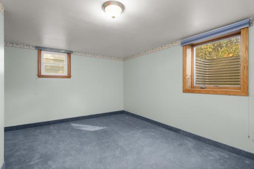The egress window completes the lower-level bedroom.