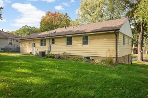 Enjoy a flat backyard with plenty of room for pets and playing.