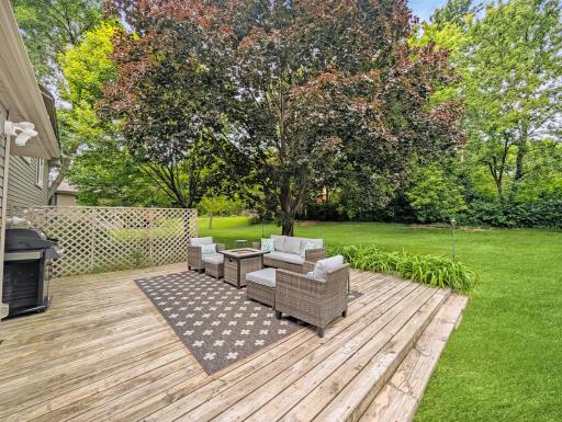 Huge deck with a lattice partial fence for privacy and style!