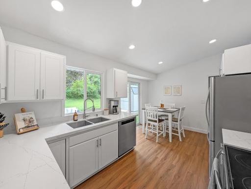 Beautiful and bright, this kitchen and dining space is welcoming and functional!