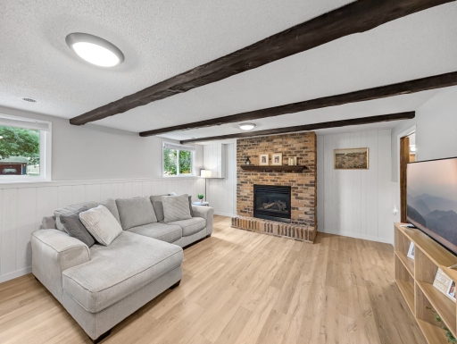 Brick fireplace in the family room on the lower level!