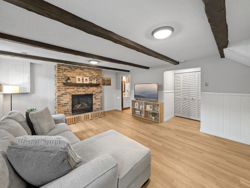 This family room on the lower level is so cozy and welcoming!