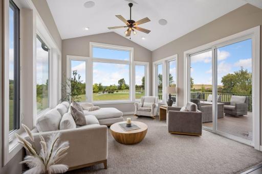 Sunroom with sliding door to deck
