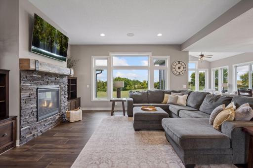 Living room with lots of natural light and beautiful view of yard