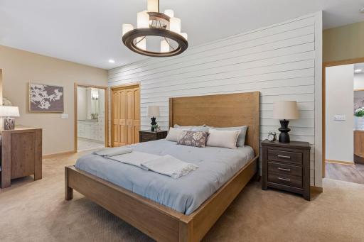 The peaceful primary suite is a retreat in itself with a luxurious escape at the end of the day.